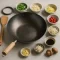 Wie man einen Wok auswählt: Material, Boden, Größe und wie man ihn wirklich zu Hause verwendet